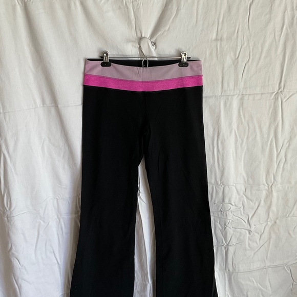 Lululemon Astro workout pants with pink waistband trim. Size 12 - Picture 1 of 3